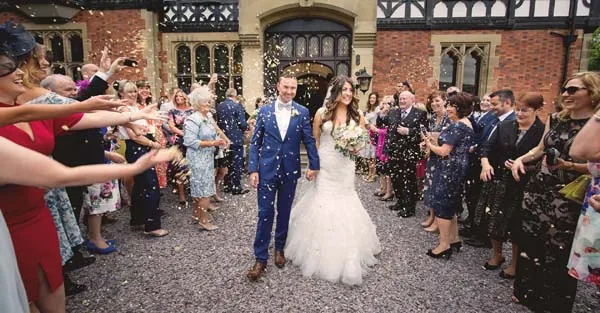 Confetti celebration at Kelly & Gav's Tyn Dwr Hall wedding, Llangollen