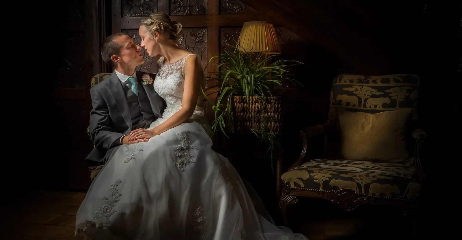 The kiss at a Rowton Hall wedding, Chester